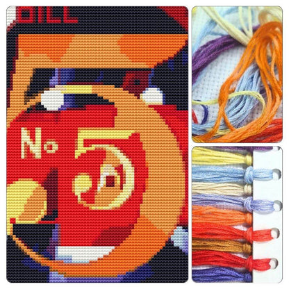 A Figure 5 in Gold Mini Cross Stitch Kit by Charles Demuth